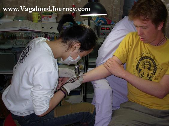 Dave Getting A Traditional Tibetan Design Of Flaming Sword Tattoo